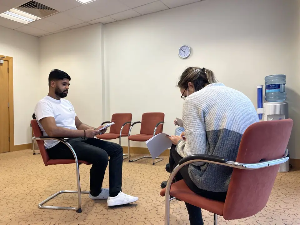 Two clinicians practising an OSCE history
